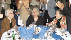 Sixty-one years after their parents donated the land for Camp Rancho Framasa, the daughters of Judy and Bert Dingle were honored on June 9. From left, Frances Quigley, Samuella “Sammy” Emrich and Margie Sperry receive a standing ovation.	(Submitted	photo)	