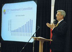 David Milroy, a member of St. Bartholomew Parish in Columbus, gives a presentation on Oct. 21 at St. Monica Parish in Indianapolis about the investments overseen by the Catholic Community Foundation (CCF). The presentation took place during a celebration of the success of the Legacy for Our Mission: For Our Children and the Future campaign and the annual meeting of the CCF board of directors. (Photo by Sean Gallagher) 