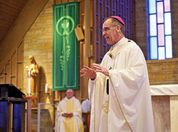 Archbishop Charles C. Thompson begins his homily with an anecdote as he speaks to members of the archdiocesan Miter Society and other supporters of the United Catholic Appeal during a Mass on Sept. 27 at Our Lady of Perpetual Help Church in New Albany. (Photo by Katie Rutter)