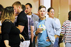 Matt Faley, archdiocesan director of Young Adult and College Campus Ministry, mingles with the crowd during a Theology on Tap gathering on June 12 in Indianapolis. (Submitted photo)