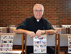 During this time when public Masses have been suspended in the archdiocese, the photos of the families of Christ the King Parish in Indianapolis have been a source of connection for Father Todd Riebe when the pastor celebrates online Masses in the parish chapel. (Photo by John Shaughnessy)