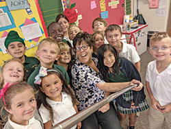 Jan Sexton, a teacher at Our Lady of the Greenwood School in Greenwood, shares a light-hearted moment with some of her students. (Submitted photo)