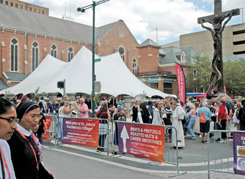 The Eucharistic Village on the grounds of St. John the Evangelist Parish in Indianapolis served as an oasis of welcome and rejuvenation for many of the 50,000 people who came to the National Eucharistic Congress on July 17-21. (Photo by John Shaughnessy)