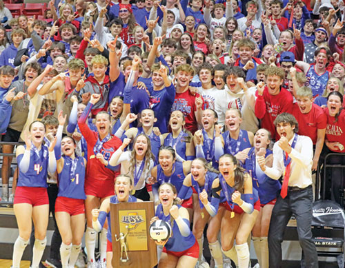 Classmates, friends, family and fans of the girls’ volleyball team of Roncalli High School in Indianapolis join in the celebration with the members of the team shortly after it won Indiana’s Class 3A state championship on Nov. 9. (Submitted photo)